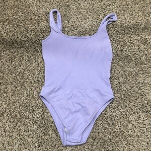purple ribbed body suit